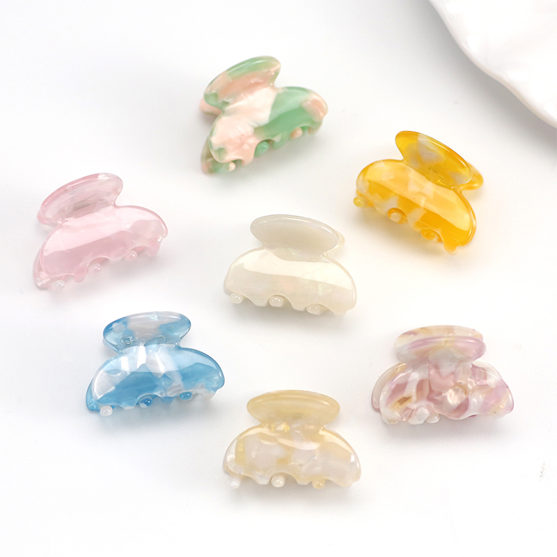 Pinza para el cabello con acetato de dientes cortos y lisos
