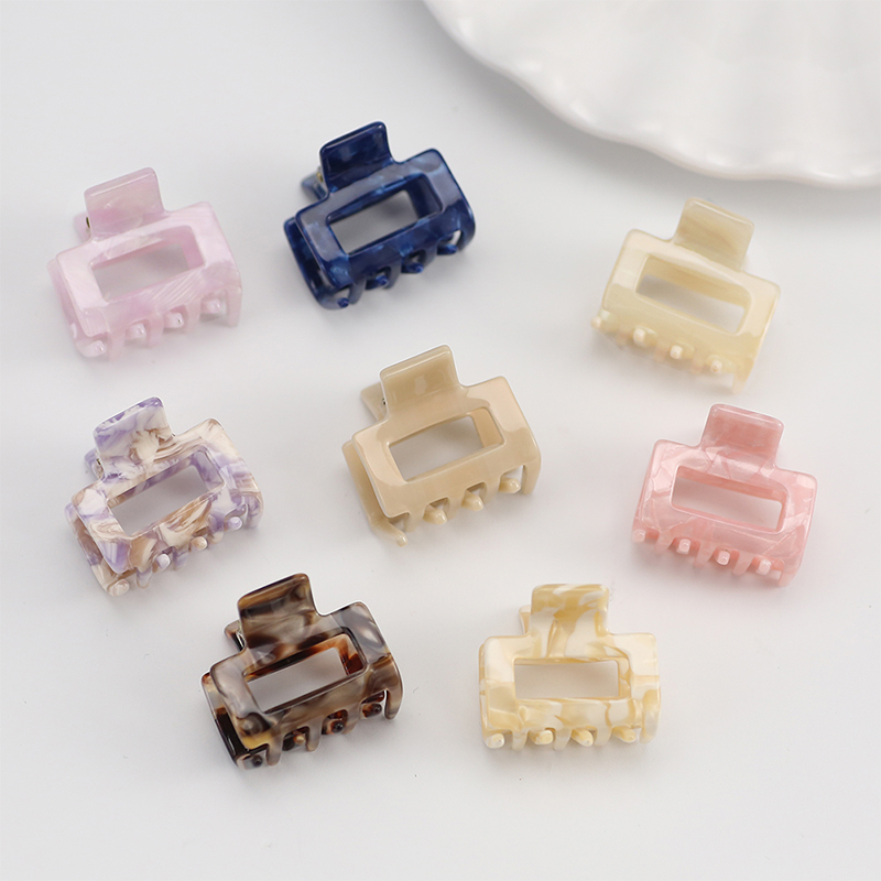 Clip rectangular para garras de acetato para el cabello con apertura central