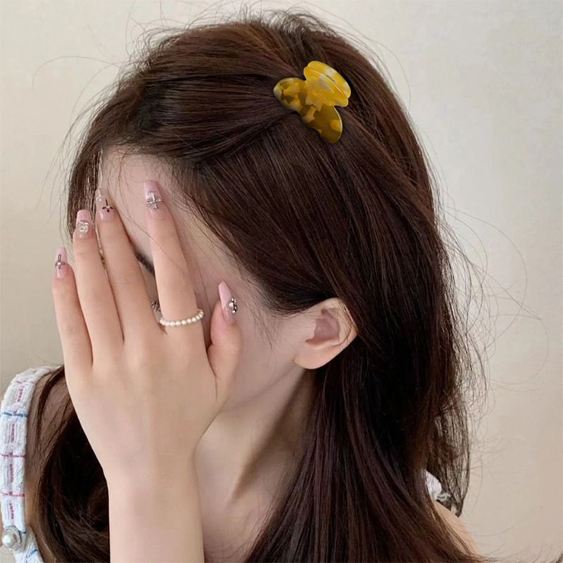 Pinza para el cabello con acetato de dientes cortos y lisos