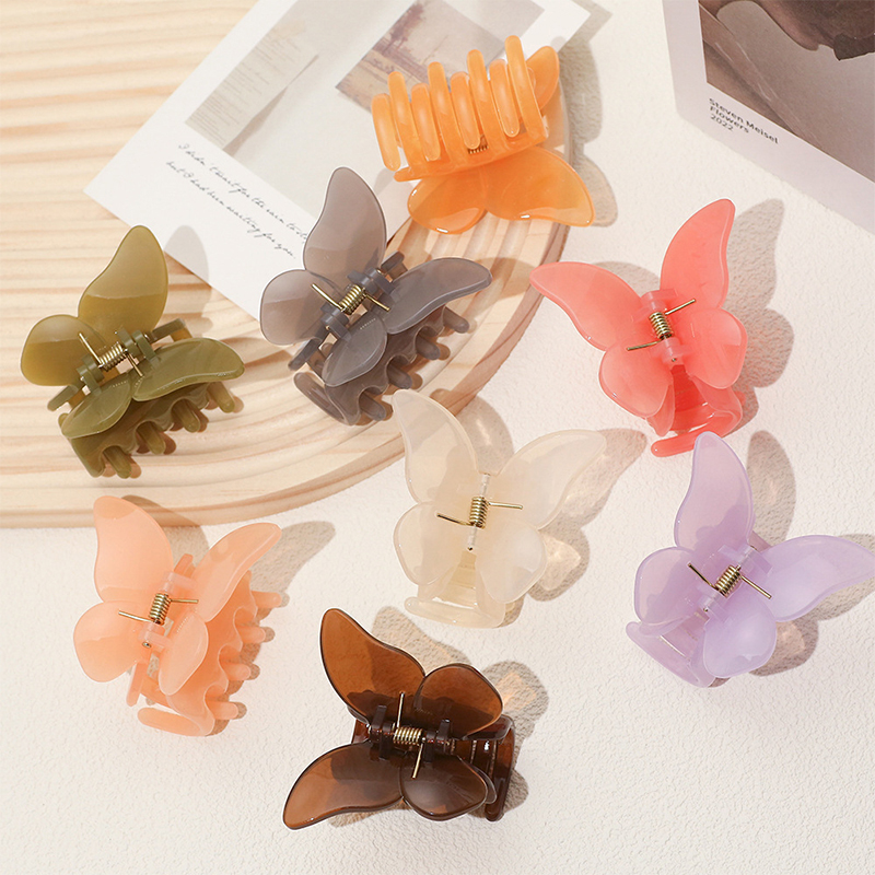 Clip de plástico para garras de cabello con inyección de mariposa