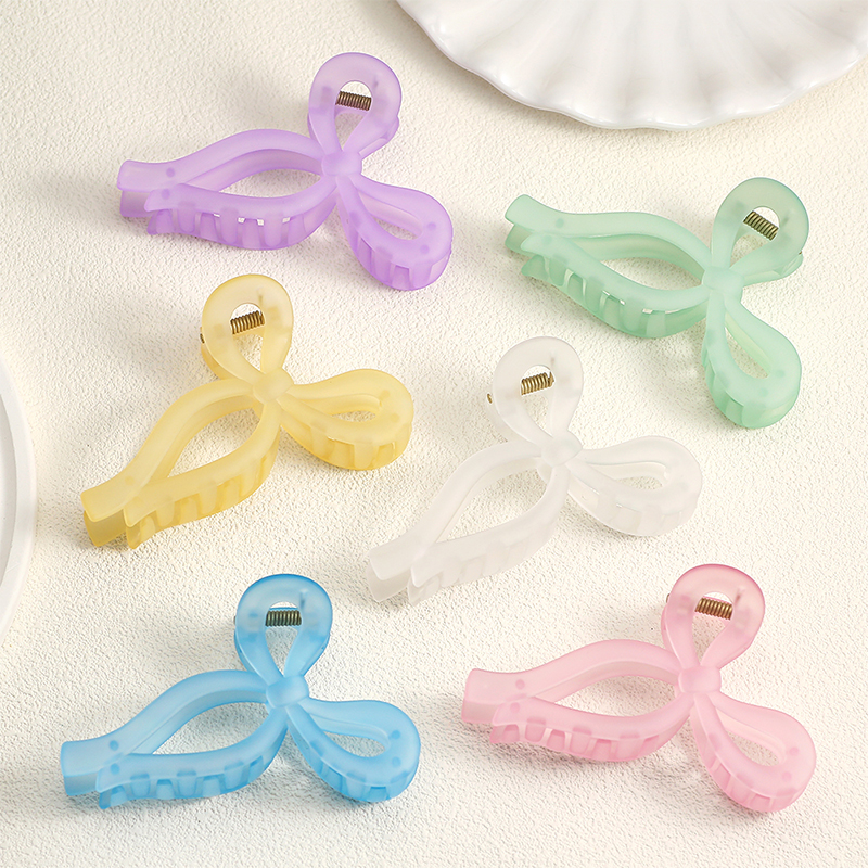 Clip para garra de cabello de plástico brillante con inyección Bowknot