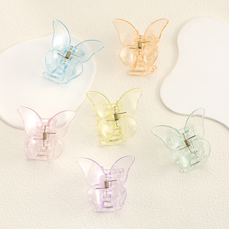 Clip de plástico para garras de cabello con inyección de mariposa