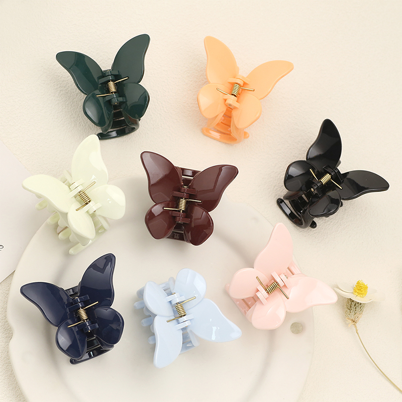 Clip de plástico para garras de cabello con inyección de mariposa