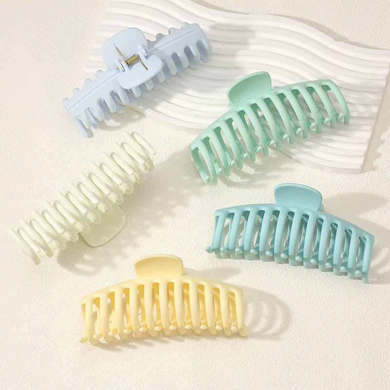 Clip para garra de cabello de plástico con inyección de quilla brillante