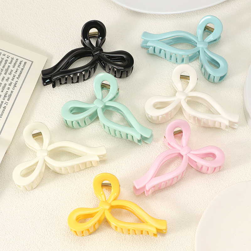 Clip para garra de cabello de plástico brillante con inyección Bowknot
