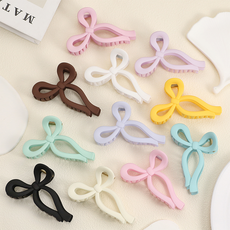 Clip para garra de cabello de plástico brillante con inyección Bowknot