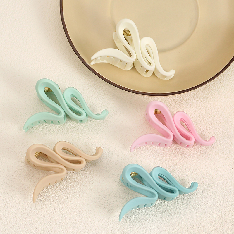 Clip para garra de cabello de plástico con inyección de goma de serpiente