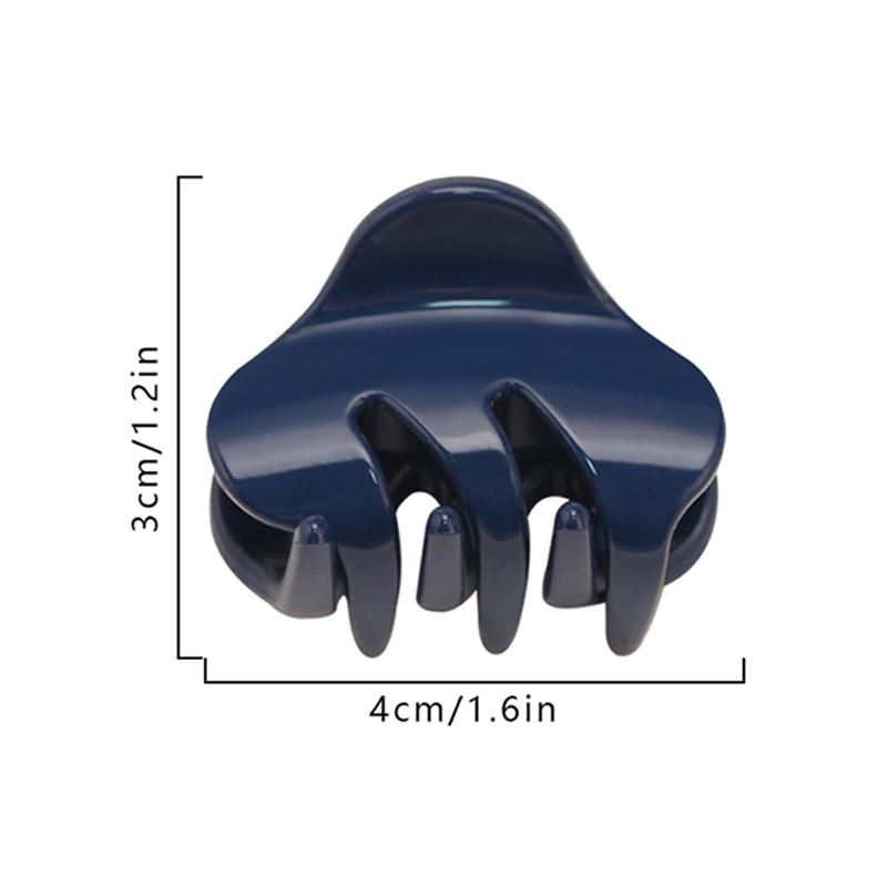 Pinza de plástico para el cabello con dientes inclinados e inyección