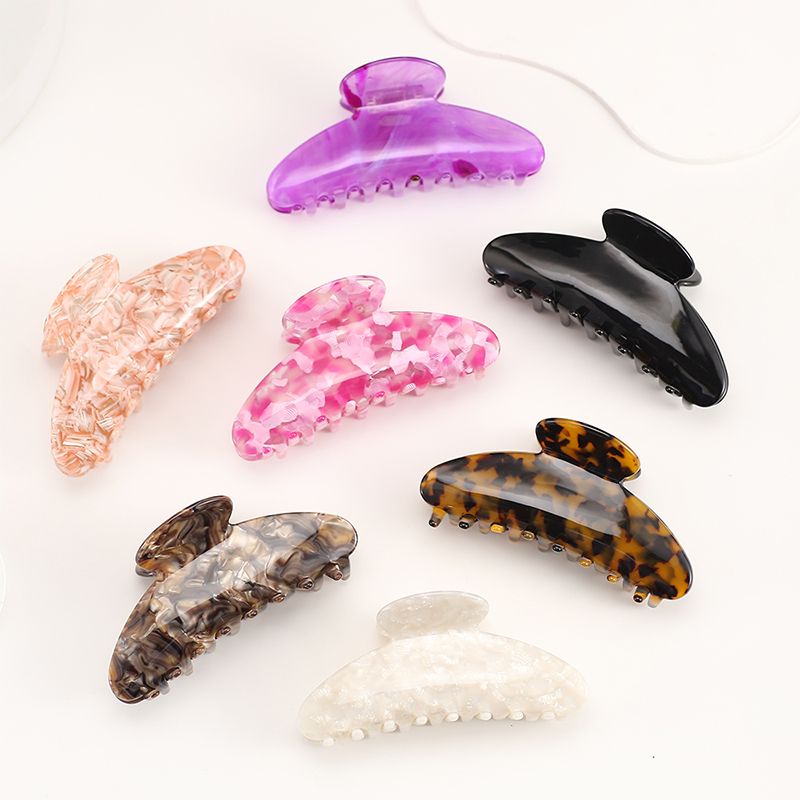 Clip ligero para garras de cabello con acetato de arco