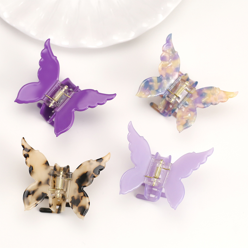 Clip simétrico para garras de cabello con acetato de alas de mariposa