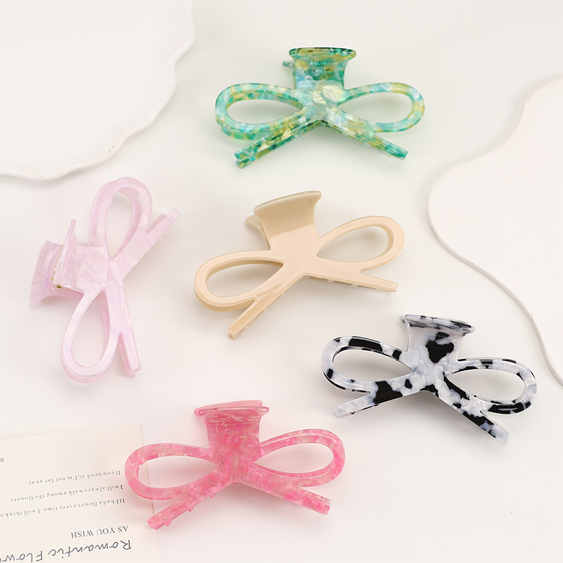 Clip decorativo para uñas de acetato de lazo
