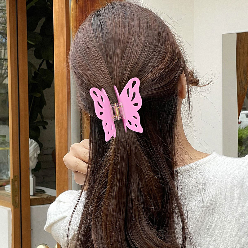 Pinza para el cabello con acetato y alas de mariposa grandes