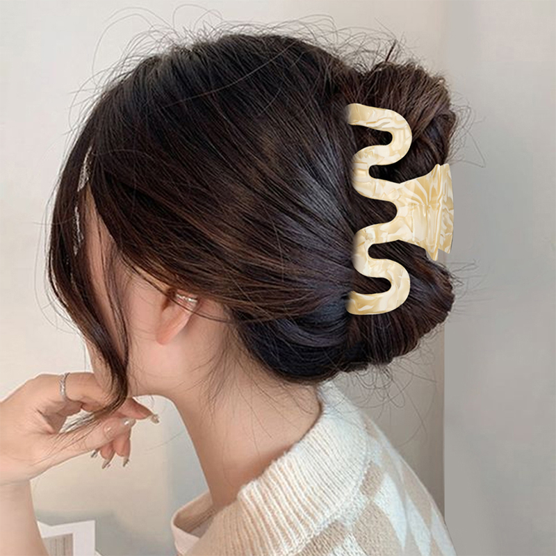 Clip para garra de cabello con acetato en forma de curva
