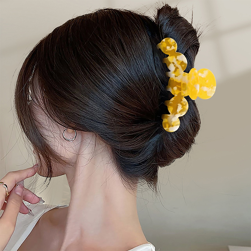 Clip redondo continuo para garras de acetato para el cabello