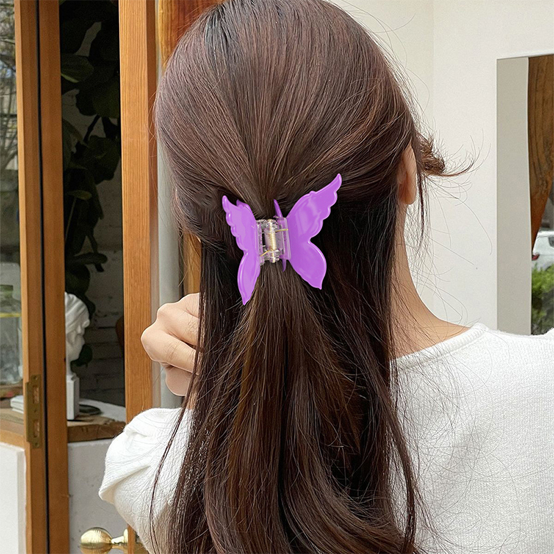 Clip simétrico para garras de cabello con acetato de alas de mariposa