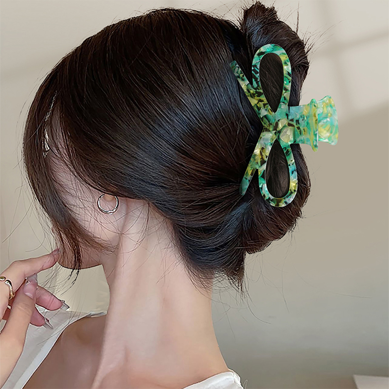 Clip decorativo para uñas de acetato de lazo