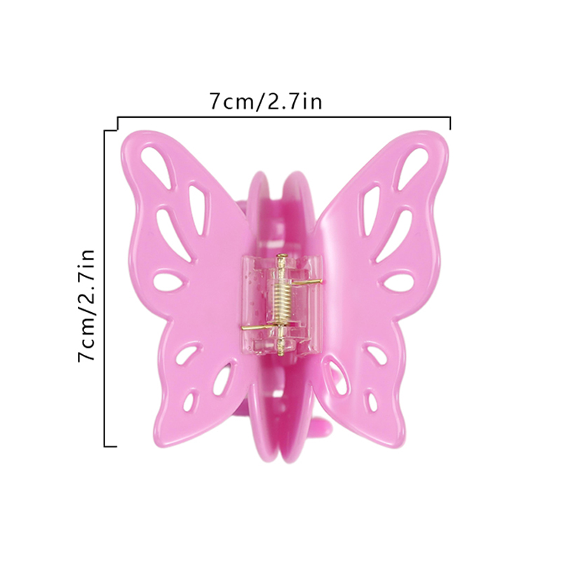Pinza para el cabello con acetato y alas de mariposa grandes