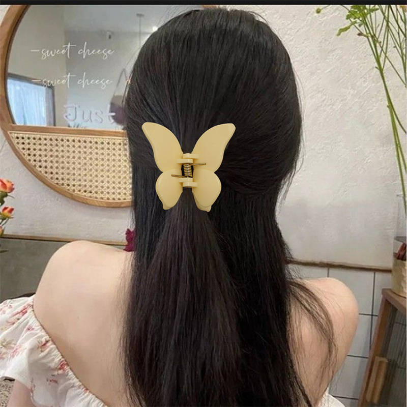 Clip de plástico para garras de cabello con inyección de mariposa