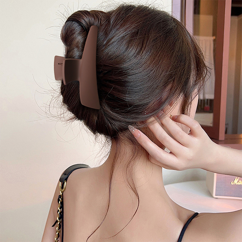 Pequeña pinza de plástico para el cabello con inyección basculante de una línea