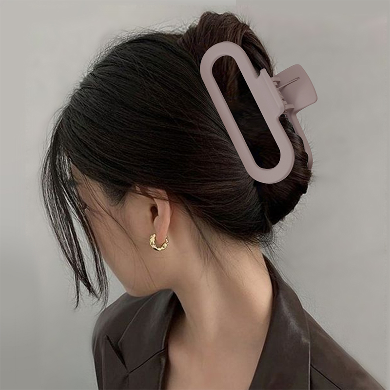 Clip ovalado de plástico para garras de cabello inyectado