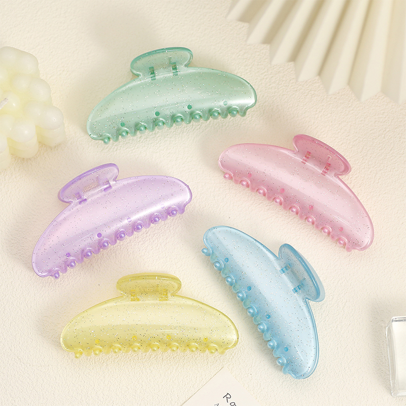 Clip de plástico para garras de cabello con inyección sectorial