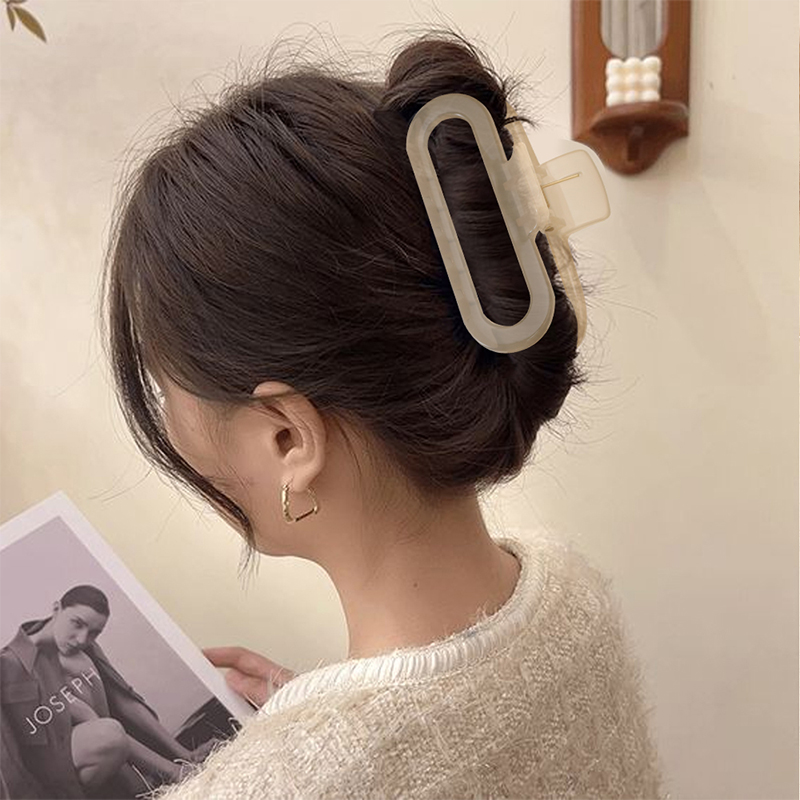Clip ovalado de plástico para garras de cabello inyectado