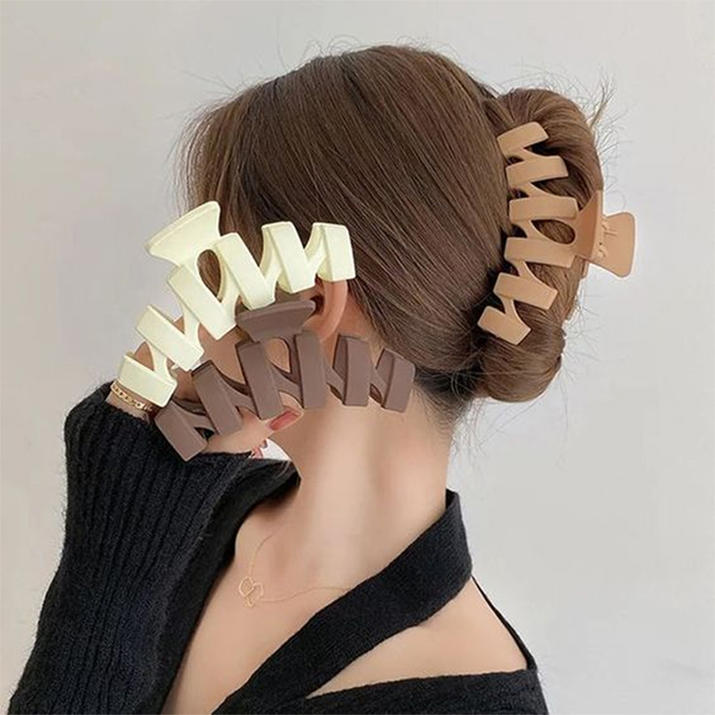 Clip para garra de cabello de plástico con inyección ondulada