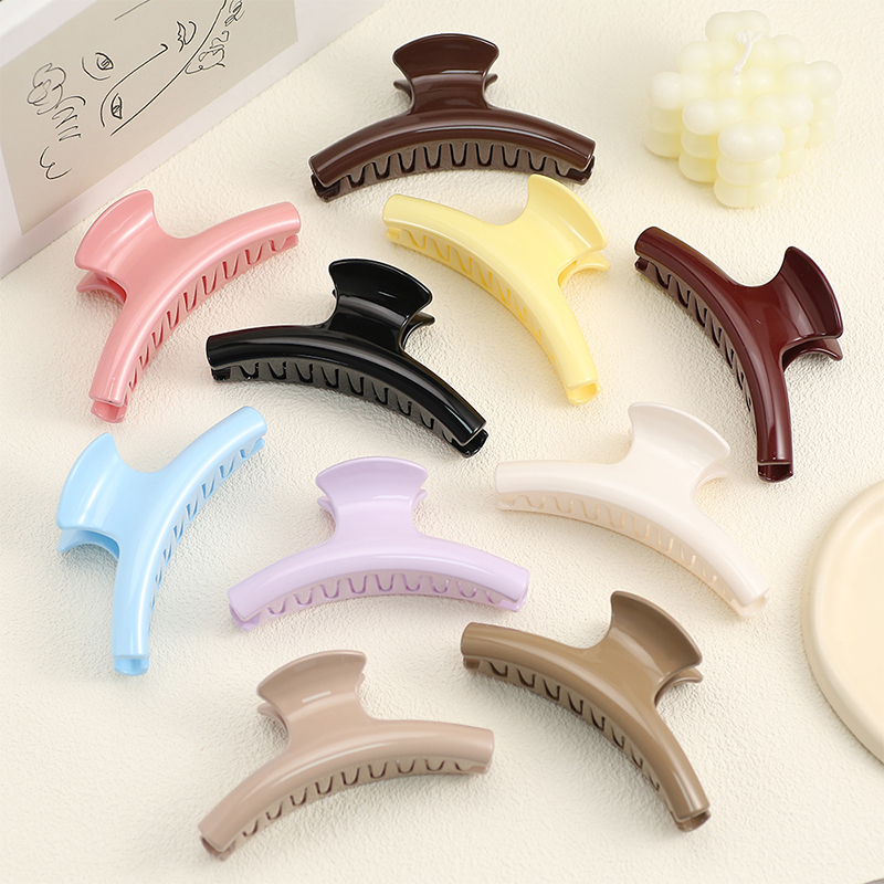 Colgador de ropa Clip de garra para el cabello de plástico con inyección de goma