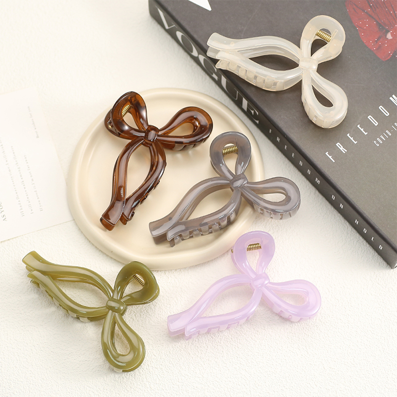 Clip para garra de cabello de plástico brillante con inyección Bowknot