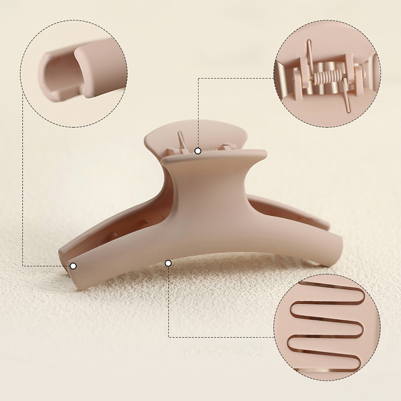 Colgador de ropa Clip de garra para el cabello de plástico con inyección de goma