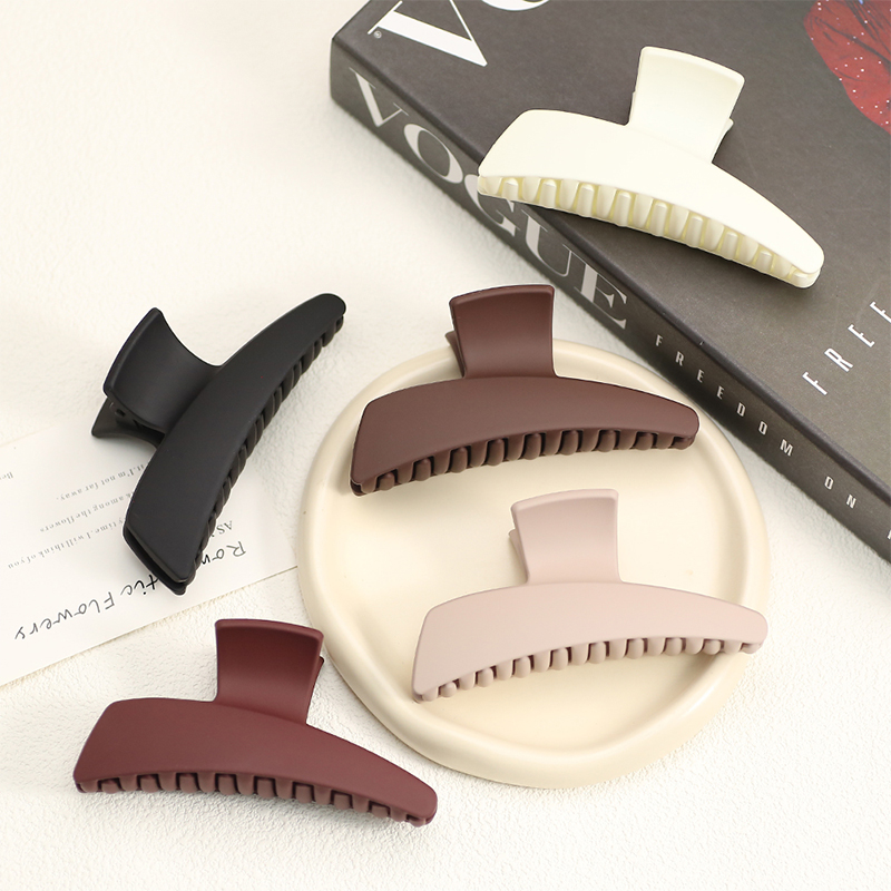 Pequeña pinza de plástico para el cabello con inyección basculante de una línea