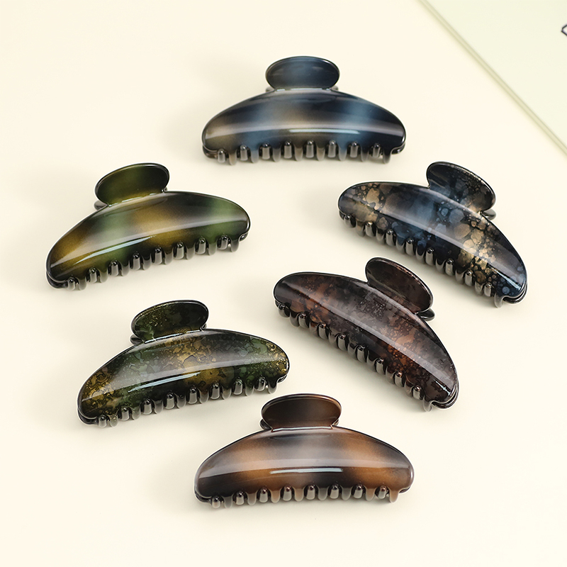 Clip de plástico para garras de cabello con inyección sectorial