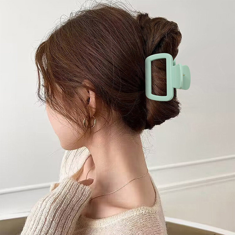 Clip de pinza para el cabello de plástico con inyección trapezoidal redondeada