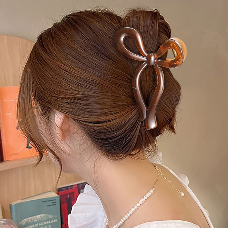 Clip para garra de cabello de plástico brillante con inyección Bowknot